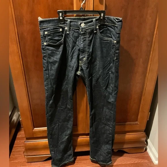 Levi’s 513 Men's Dark Blue Jeans size 34x30 - Picture 1 of 7